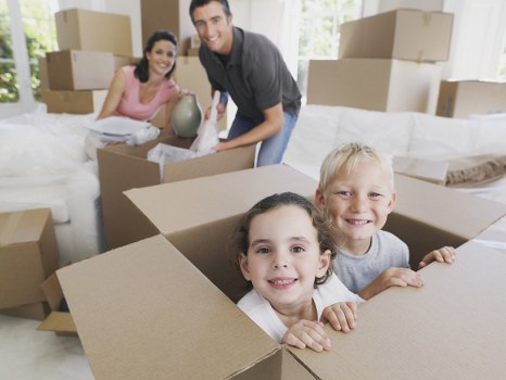 Local removals service in Surrey with moving van and residential properties