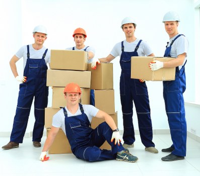 Loading furniture into a moving van for a Surrey relocation