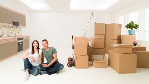 Packed office equipment prepared for transport during a Surrey business move