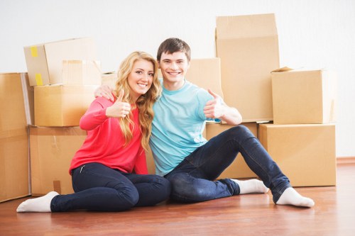 Packed moving boxes and furniture ready for a Surrey home move