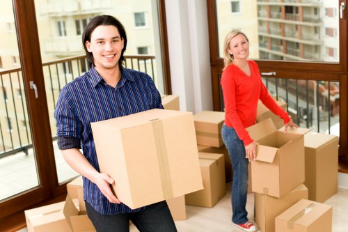 Packed boxes and furniture ready for a Surrey home move