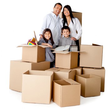 Preparing packed boxes and furniture for a moving van in Surrey